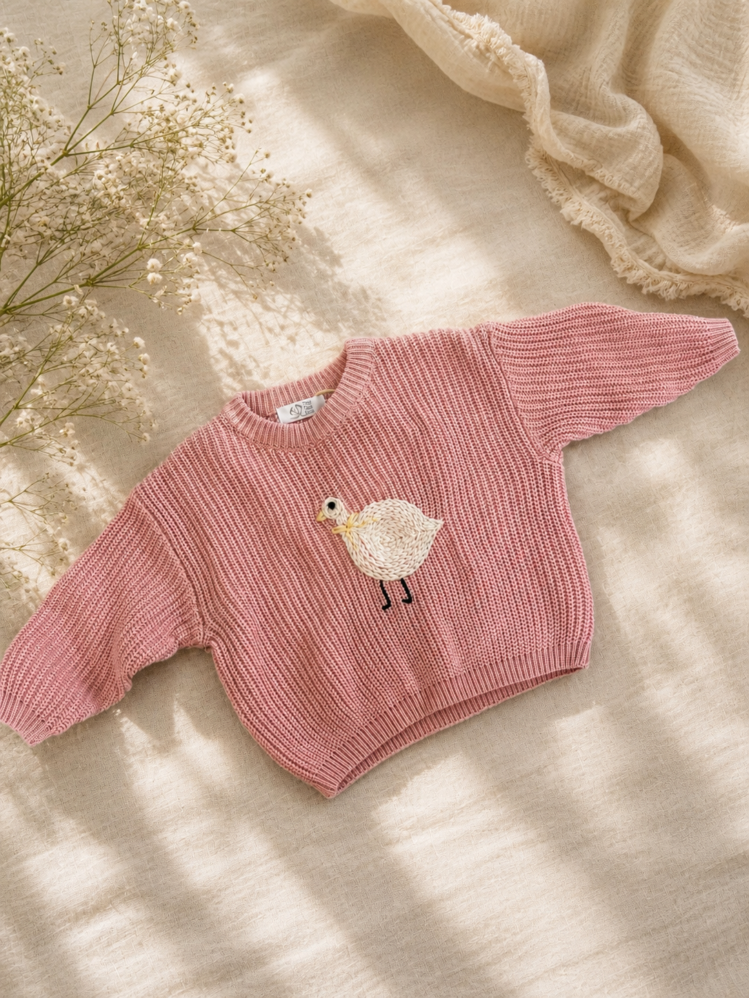 Hand embroidered goose jumper