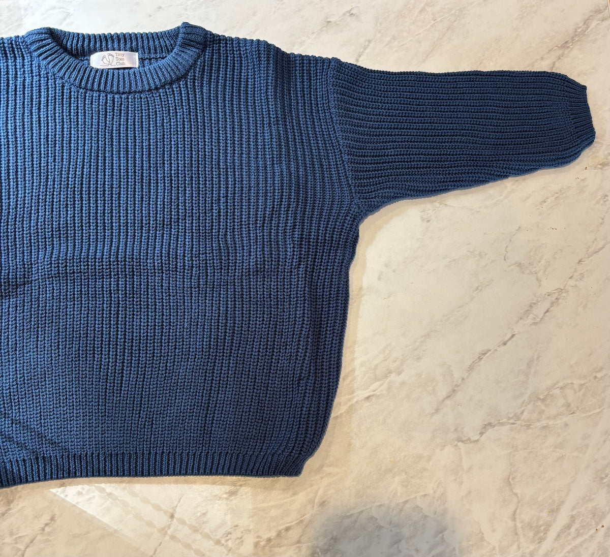 Navy coloured jumper
